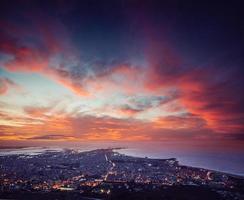 city with a night on the beach photo