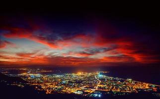 city with a night on the beach photo