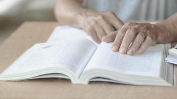 man hand on book photo