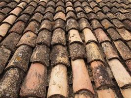 old weathered roof tiles background photo