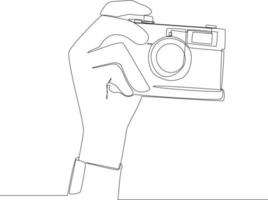 línea continua simple dibujando una mano mano arriba de una cámara, ilustración vectorial. vector