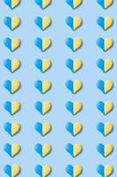 Pattern with heart shape of yellow-blue colors of the Ukrainian flag. Vertical format photo