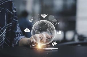 Businesswoman using mobile phone for communication working and transaction ,Global  business by internet connection technology for financial banking , big data and digital linkage concept. photo