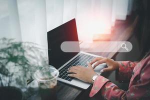 woman searching browsing internet data information with blank search bar. Search engine optimization SEO networking concept. businessman working with computer laptop on desk. photo