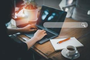 Searching engine with blank search bar, Search engine optimization. Searching Browsing Internet Data Information Networking Concept, Human hand use laptop to search the internet, SEO photo