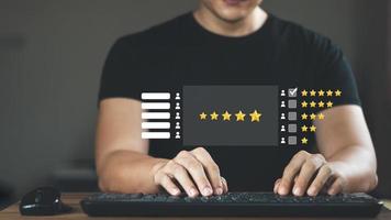 User give rating to service experience on online application, Customer review satisfaction feedback survey concept, Customer can evaluate quality of service leading to reputation ranking of business. photo