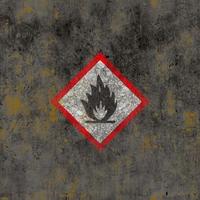 Flammable warning sign.  on the wall photo