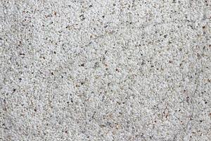 Exposed aggregate finish walls or floor. Concrete texture for background. Top view.