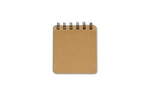 Brown hardcover notebook with a black loop. Blank book isolated on white background with clipping path. Top view. photo