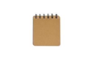 Brown hardcover notebook with a black loop. Blank book isolated on white background with clipping path. Top view. photo