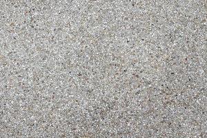Exposed aggregate finish walls or floor. Concrete texture for background. Top view. photo
