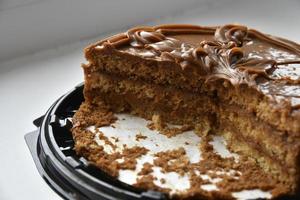 Delicious chopped honey cake with boiled condensed milk photo