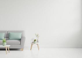 Empty living room with brown color sofa,ornamental glass jar and table on empty white wall background.