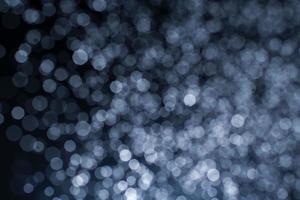 Dark blue abstract background with bokeh. photo