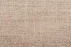 Burlap, sackcloth brown grainy cotton cloth texture background photo