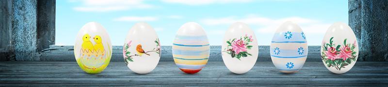 Easter background with colorful easter eggs on wooden background. photo