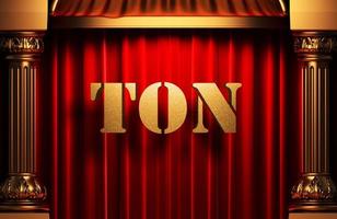 ton golden word on red curtain photo
