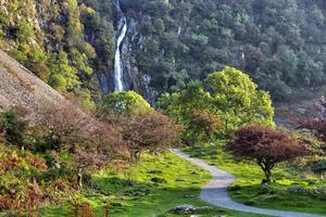 Gravel path leading to Aber Falls in Wales photo