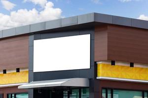 Mockup image of Blank billboard white screen posters and led outside storefront for advertising photo