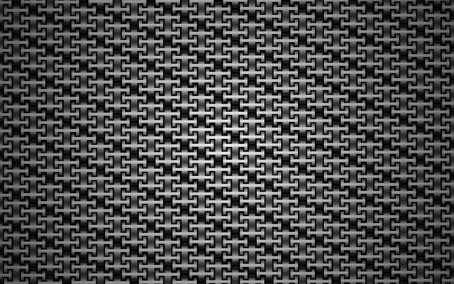 Abstract background texture. Black and gray carbon textured repeating pattern. Metallic chain pattern. Iron metal chain
