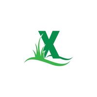 Letter X behind a green grass icon logo design vector