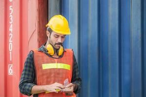 Factory worker with a cigarette smoke break, Labour takes a cigarette break photo