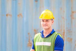 Cheerful engineer man in hard hat smiling and looking at camera, Happiness concept photo