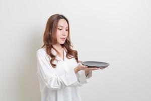 portrait beautiful Asian woman holding empty plate photo