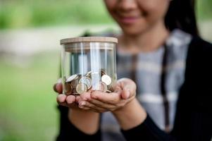 Hands and savings of close-up young women for business Business concept - image photo