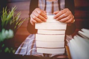 Hand and book of young women Is reading books for education Education concept photo