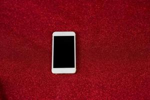 Red background image and beautiful phone Communication technology concept photo