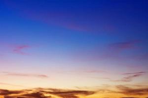 Blue sky background with beautiful clouds photo