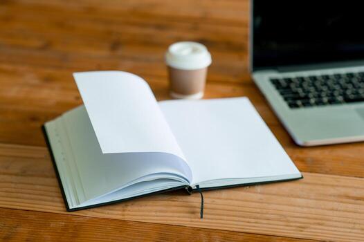 A desk with a business computer and a note on the desk. Business concept with copy space. photo