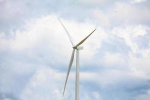 Wind turbines with the clouds and sky photo