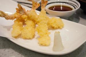 Japanese cuisine, tempura deep fried shrimps with sauce photo