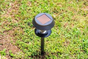 Solar power garden lamp photo