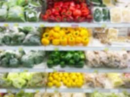 Vegetables on shelf in supermarket photo