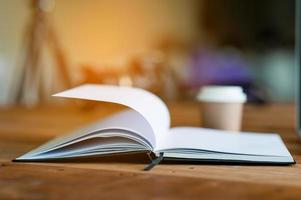 The book is placed on a business desk. The concept of reading with copy space. photo