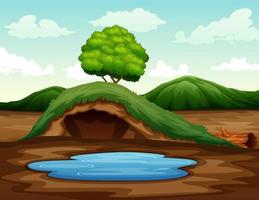 Empty underground animal hole with a small pond illustration vector