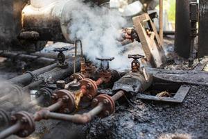 Corrosion rusty through valve tube steam gas leak pipeline photo