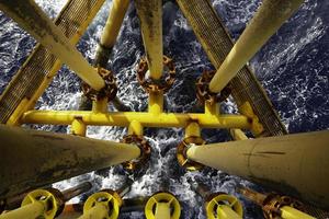 Offshore drill yellow oil and gas on sea photo