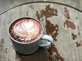 Latte art on hot chocolate photo