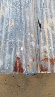 Texture and pattern of galvanized sheet. One piece of galvanized sheet. Rusted galvanized sheet. photo