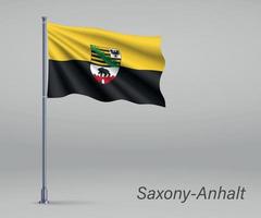 Waving flag of Saxony-Anhalt - state of Germany on flagpole. vector