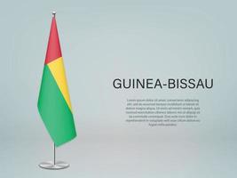Guinea-Bissau hanging flag on stand. vector