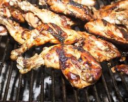 Grilled chicken Leg on the grill photo