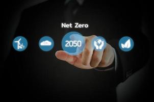 Businessman touching net zero virtual screen Internet Business Technology Concept. photo