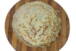 pancakes on a wooden stand photo