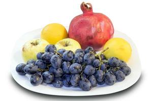 pomegranate, grape with apple and lemon photo