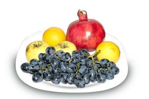 pomegranate, grape with apple and lemon photo